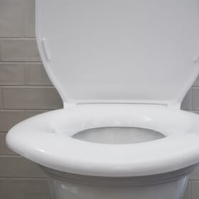 Wide toilet clearance seat